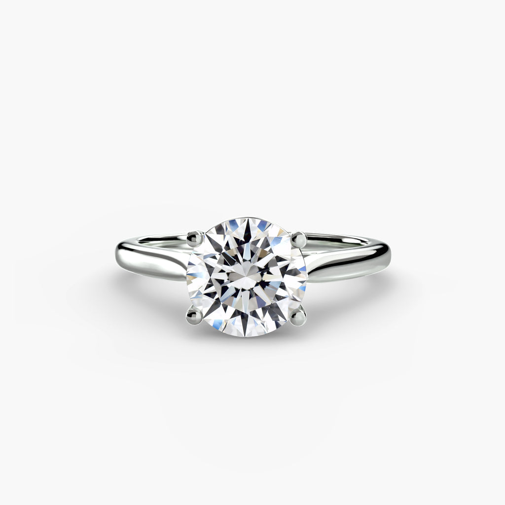 Front view of The Amélie solitaire engagement ring