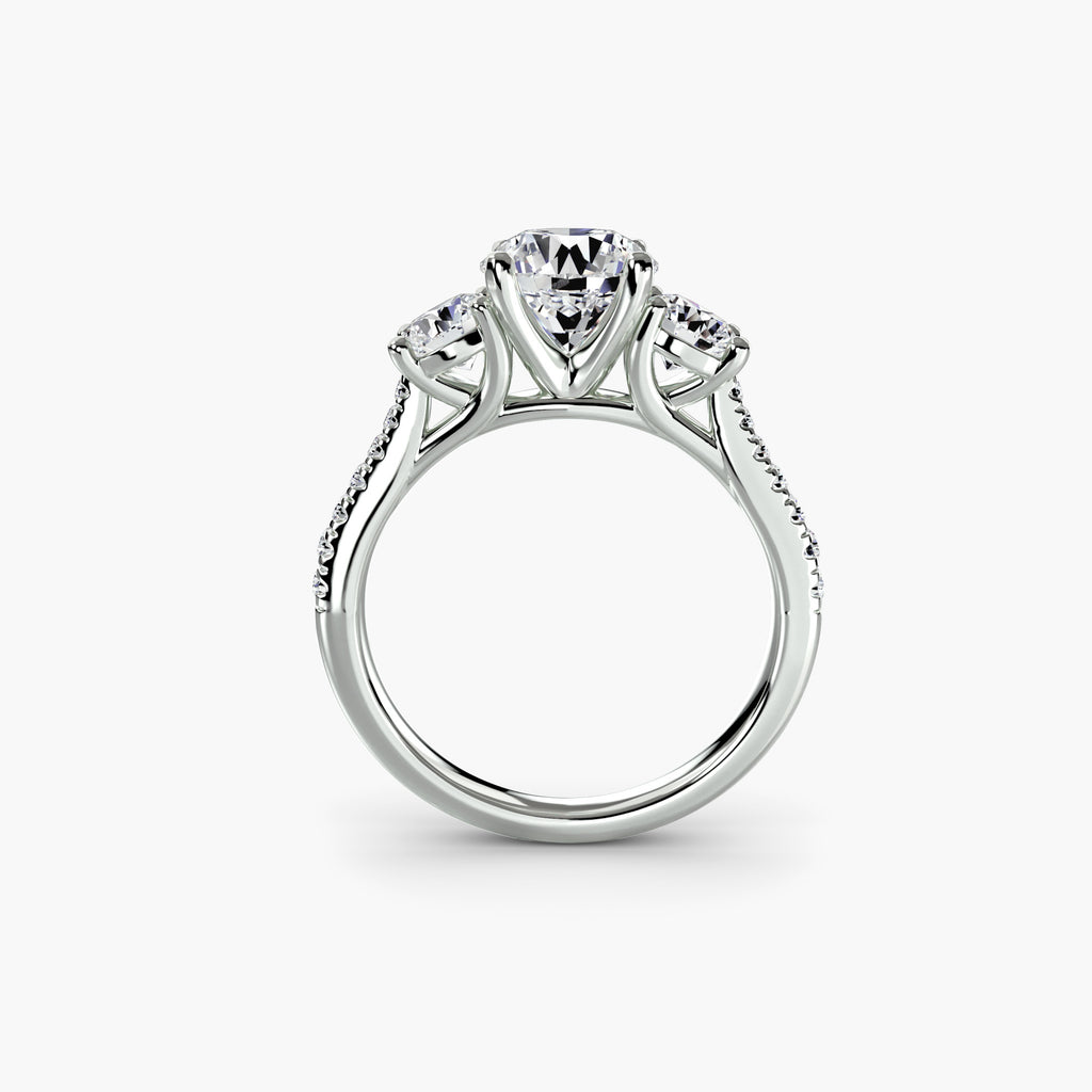 Profile view of classic three-stone pavé engagement ring – The Verona
