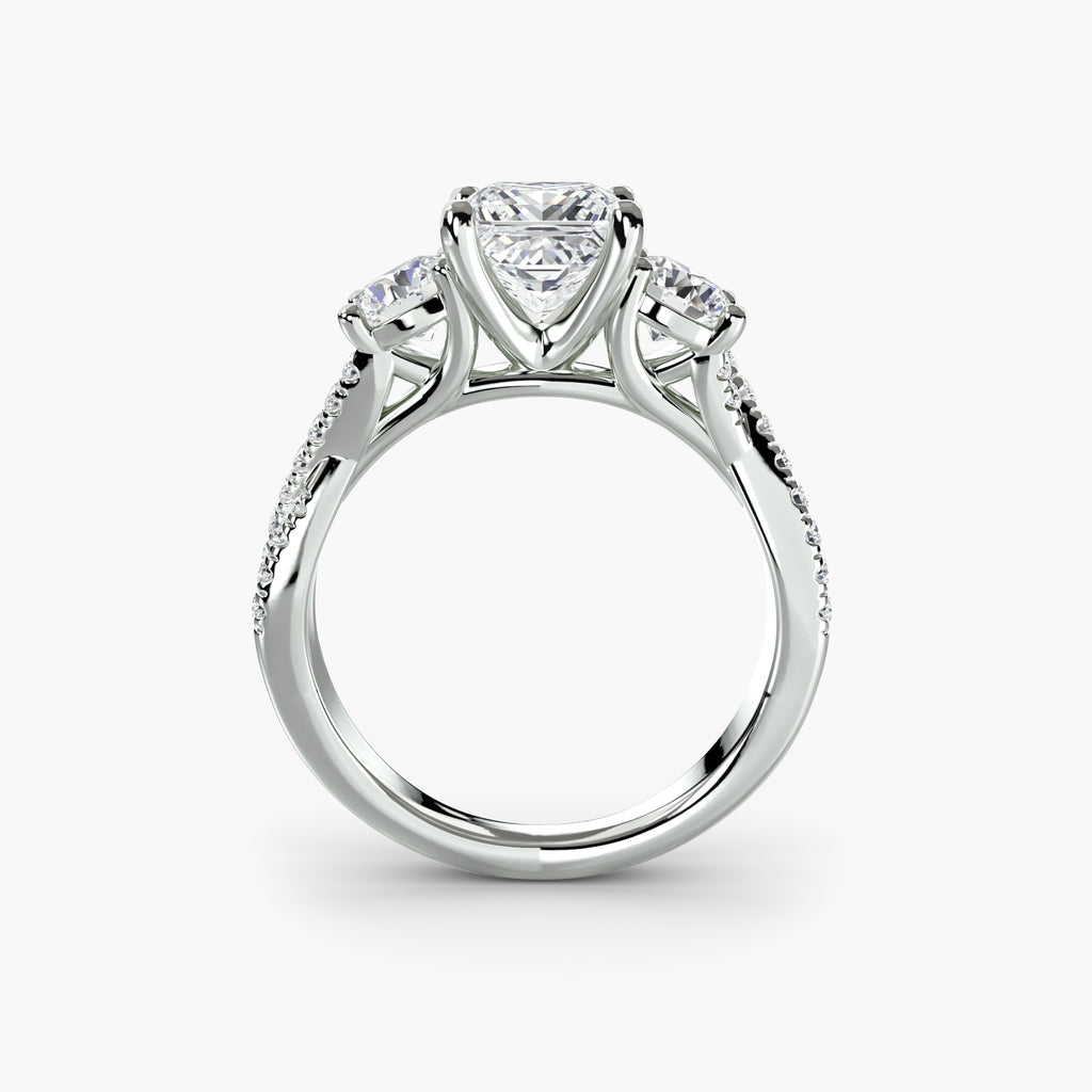 Profile view of three-stone pavé engagement ring – The Marcelle