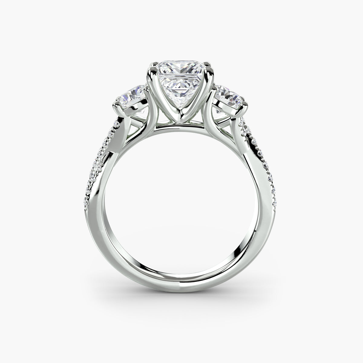 Profile view of three-stone pavé engagement ring – The Marcelle