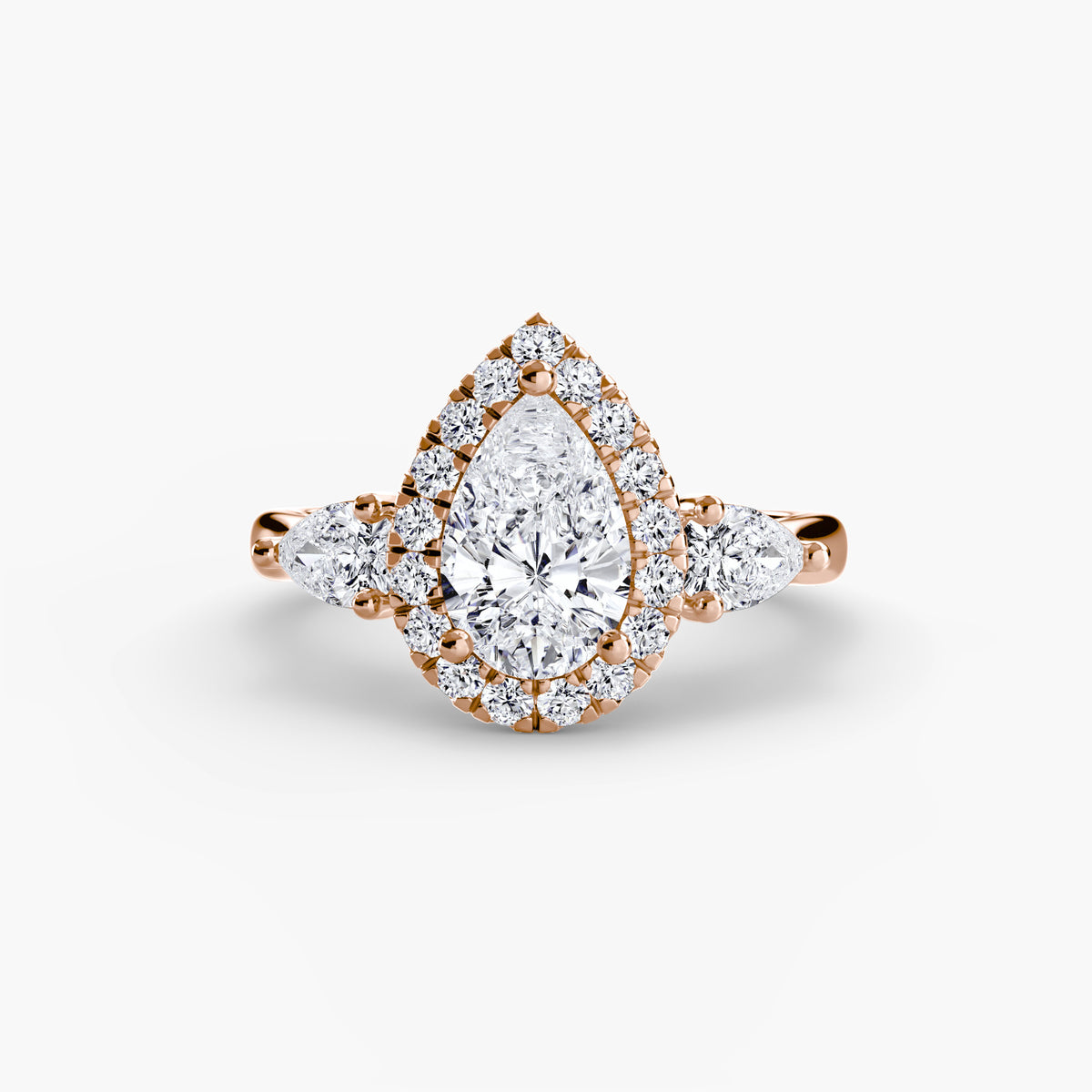 Three-Stone Halo Engagement Ring – The Clarimond