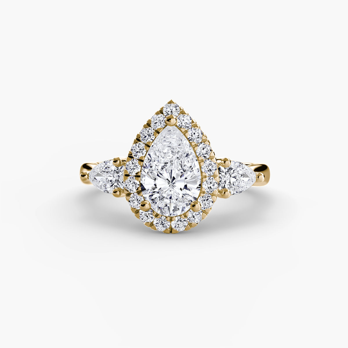 Three-Stone Halo Engagement Ring – The Clarimond