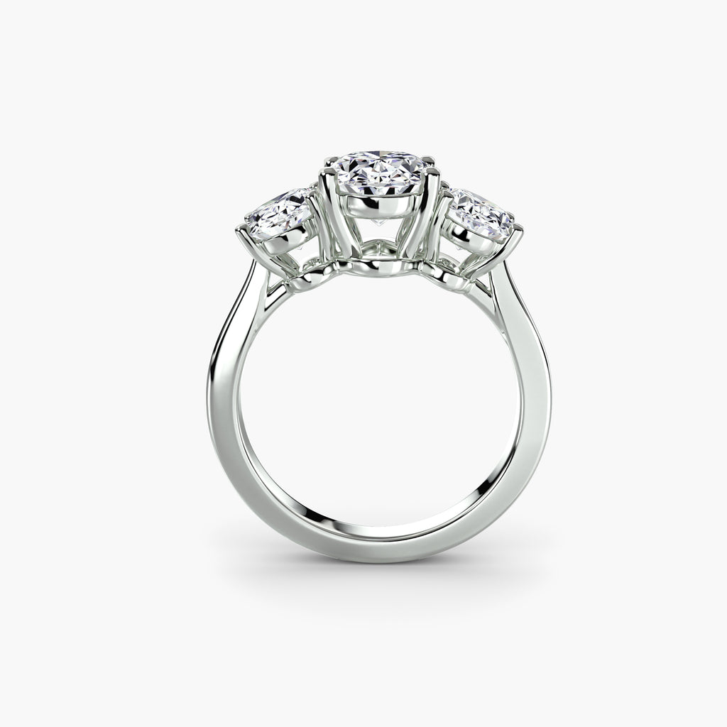 Profile view of oval three-stone engagement ring – The Odette