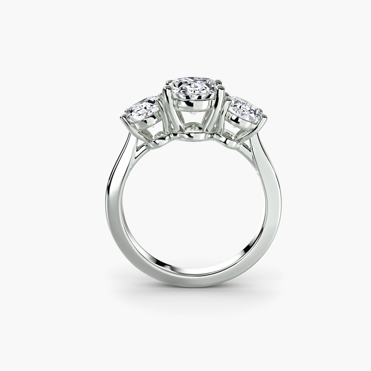 Profile view of oval three-stone engagement ring – The Odette
