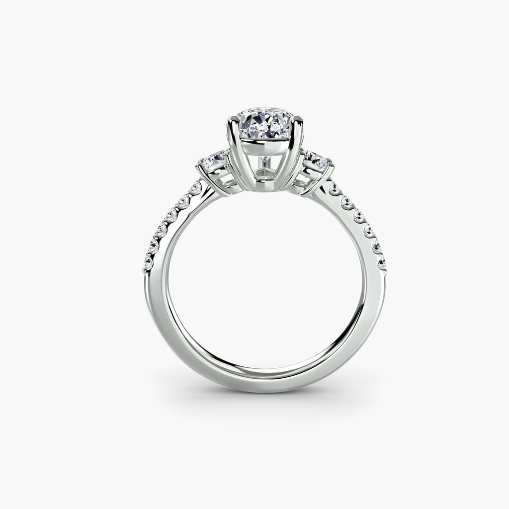 Profile view of pear side-stone pavé engagement ring – The Florence