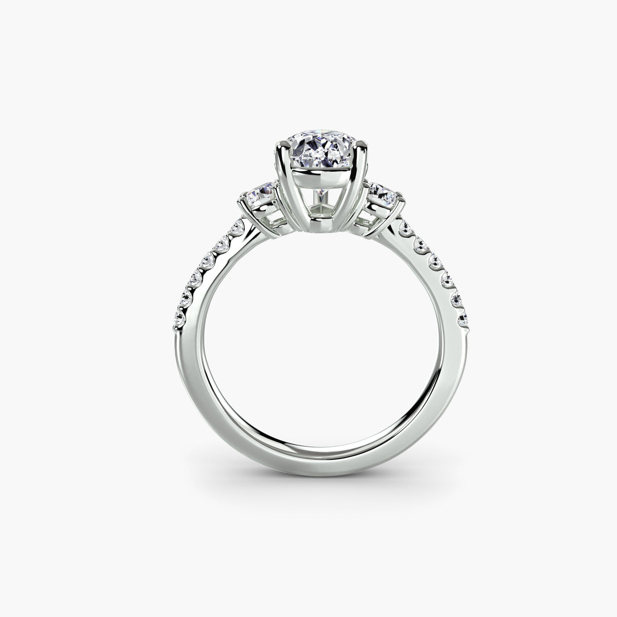 Profile view of pear side-stone pavé engagement ring – The Florence