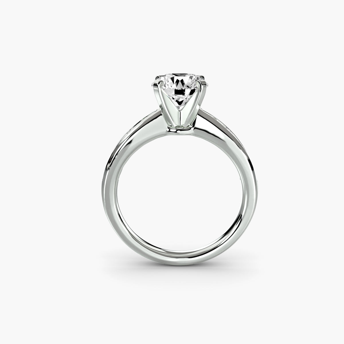 Profile view of The Adrienne engagement ring with tapered channel-set diamond shoulders