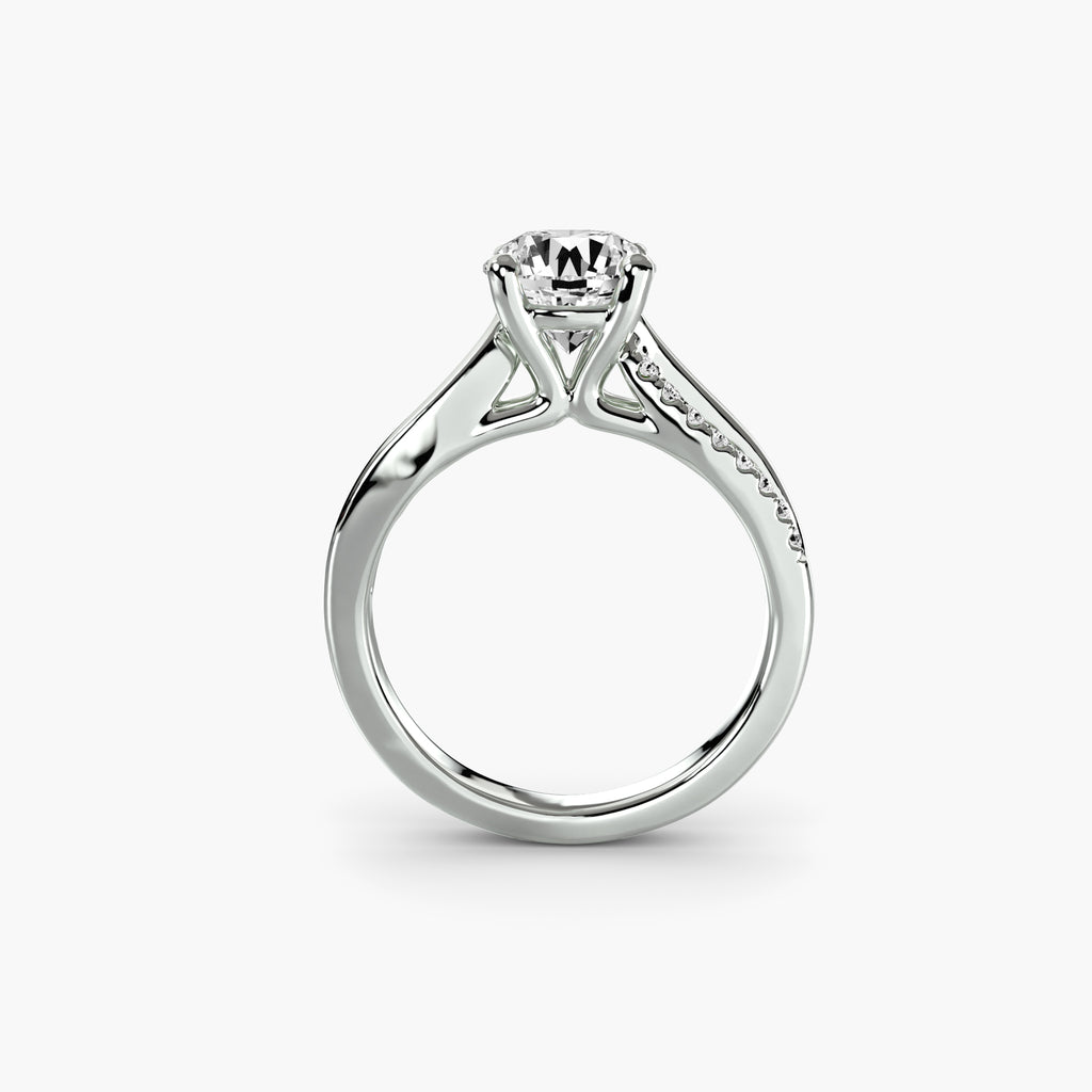 Profile view of The Élodie engagement ring with open split-shank pavé shoulders