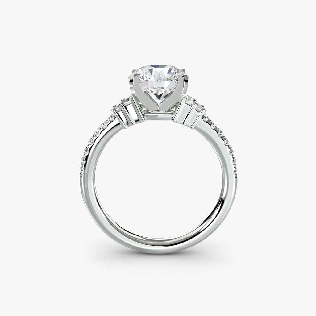 Profile view of The Estelle engagement ring with baguette and pavé diamond accents