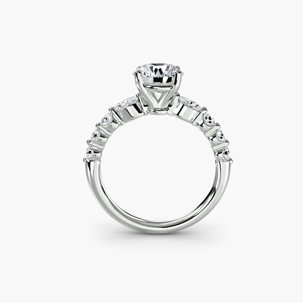 Profile view of The Margaux engagement ring with graduated round diamond side stones