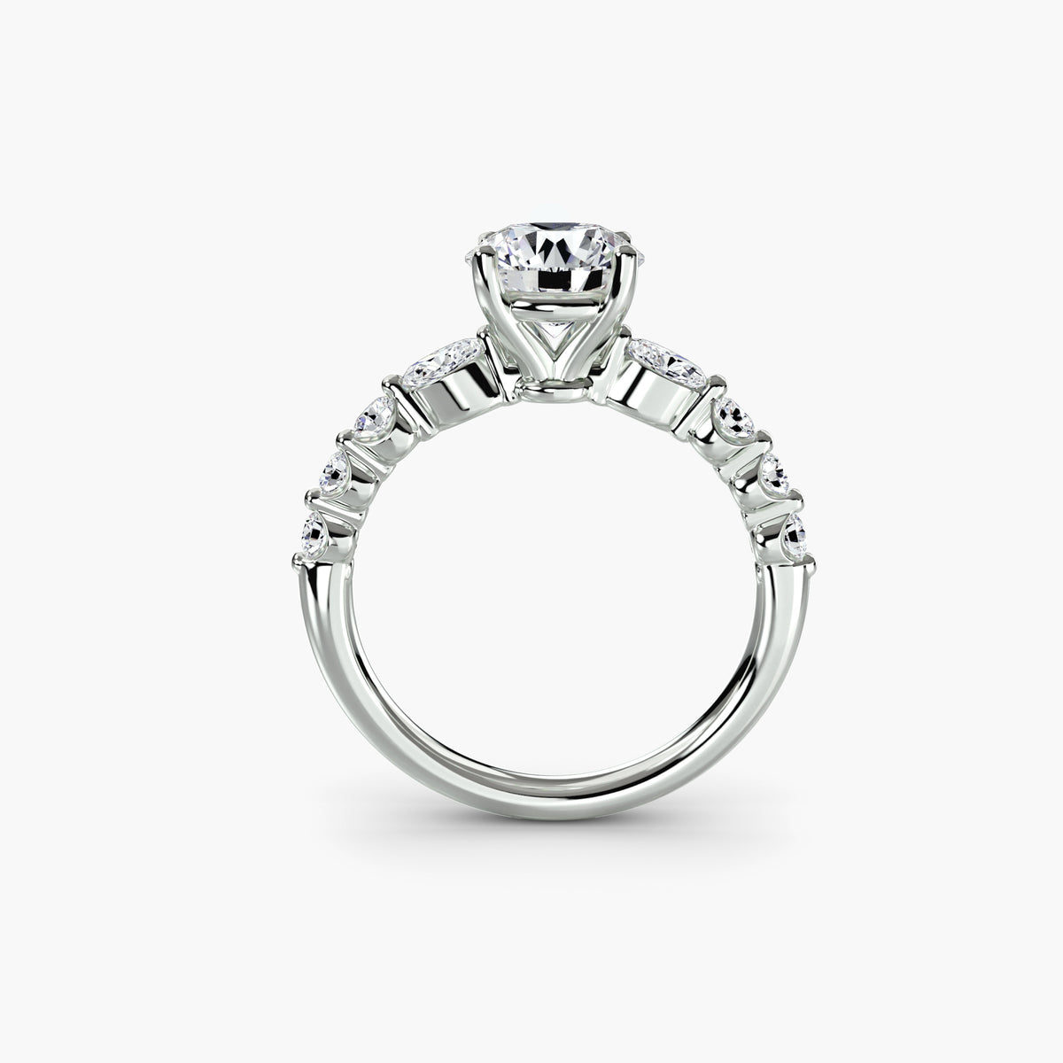 Profile view of The Margaux engagement ring with graduated round diamond side stones