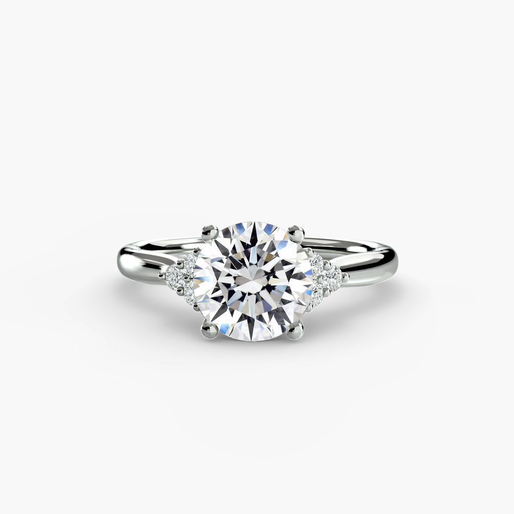 Front view of The Céleste side stone solitaire engagement ring