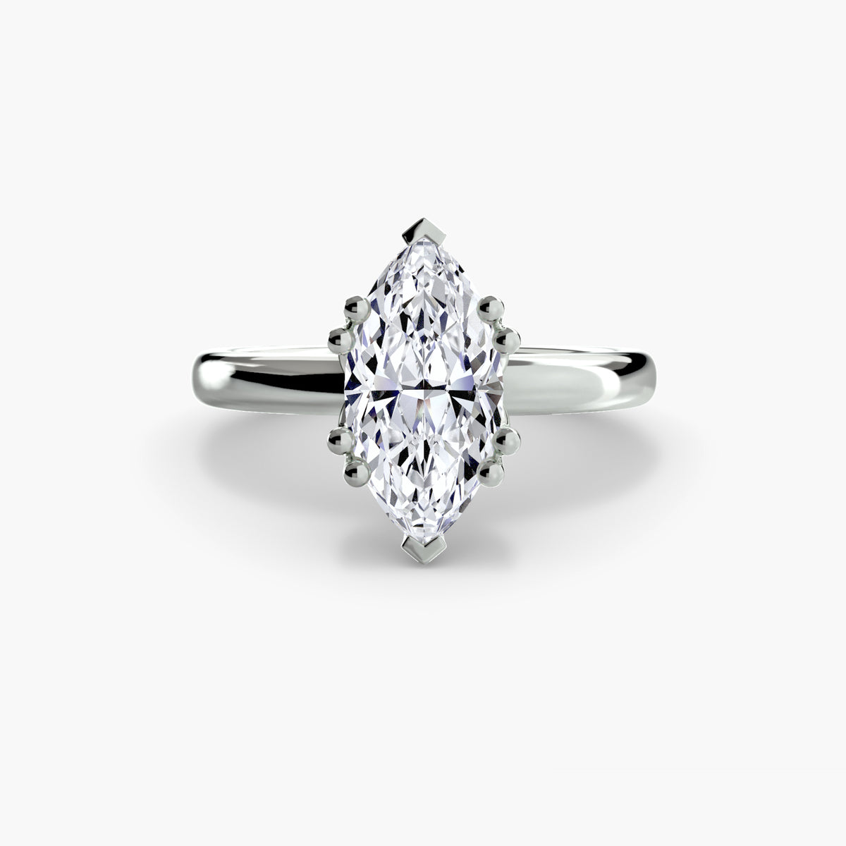 Four-Prong Solitaire Engagement Ring – The Adeline