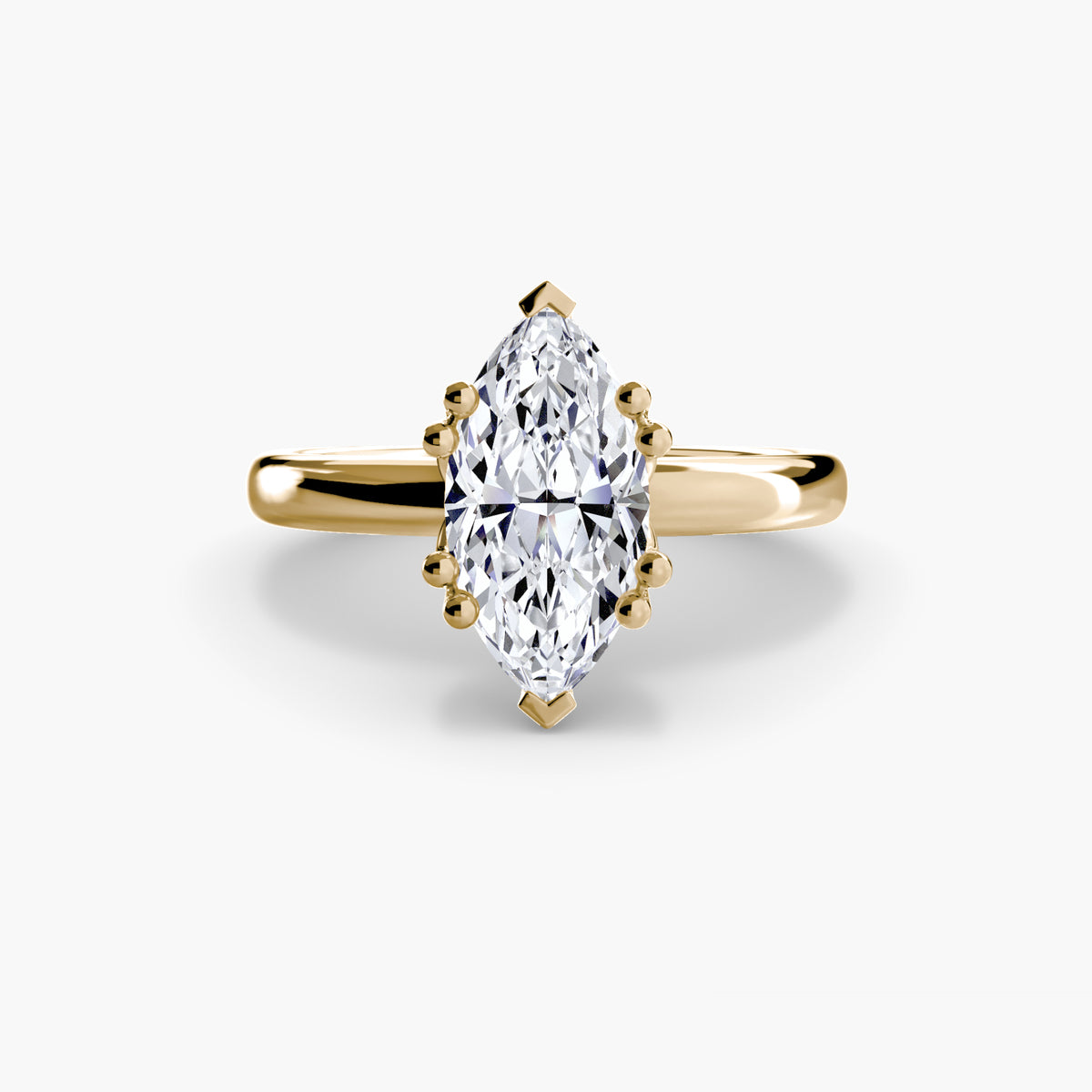 Four-Prong Solitaire Engagement Ring – The Adeline