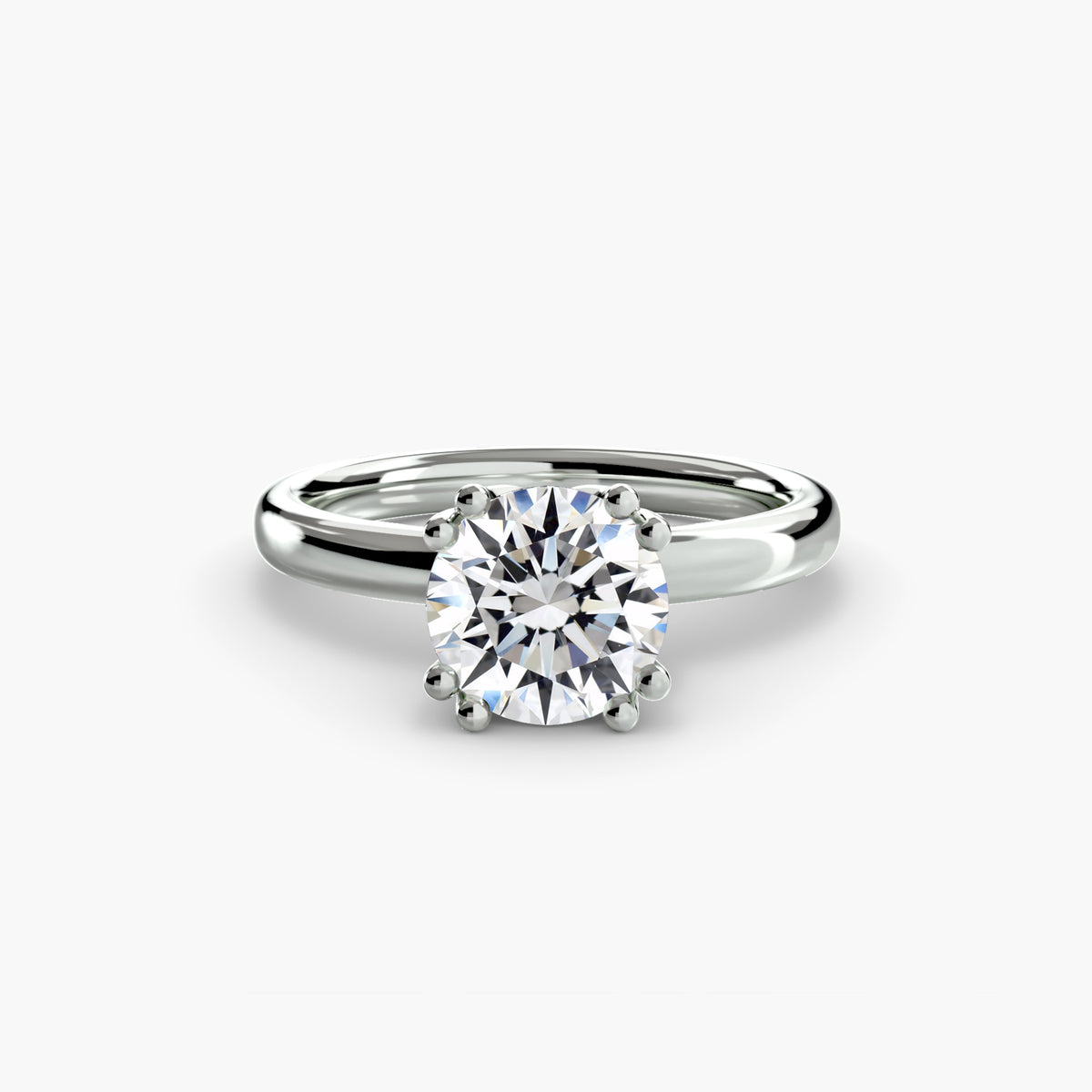 Four-prong solitaire engagement ring – The Adeline