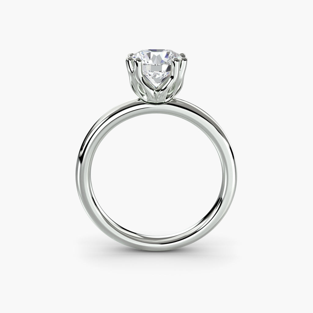 Profile view of four-prong solitaire engagement ring – The Adeline