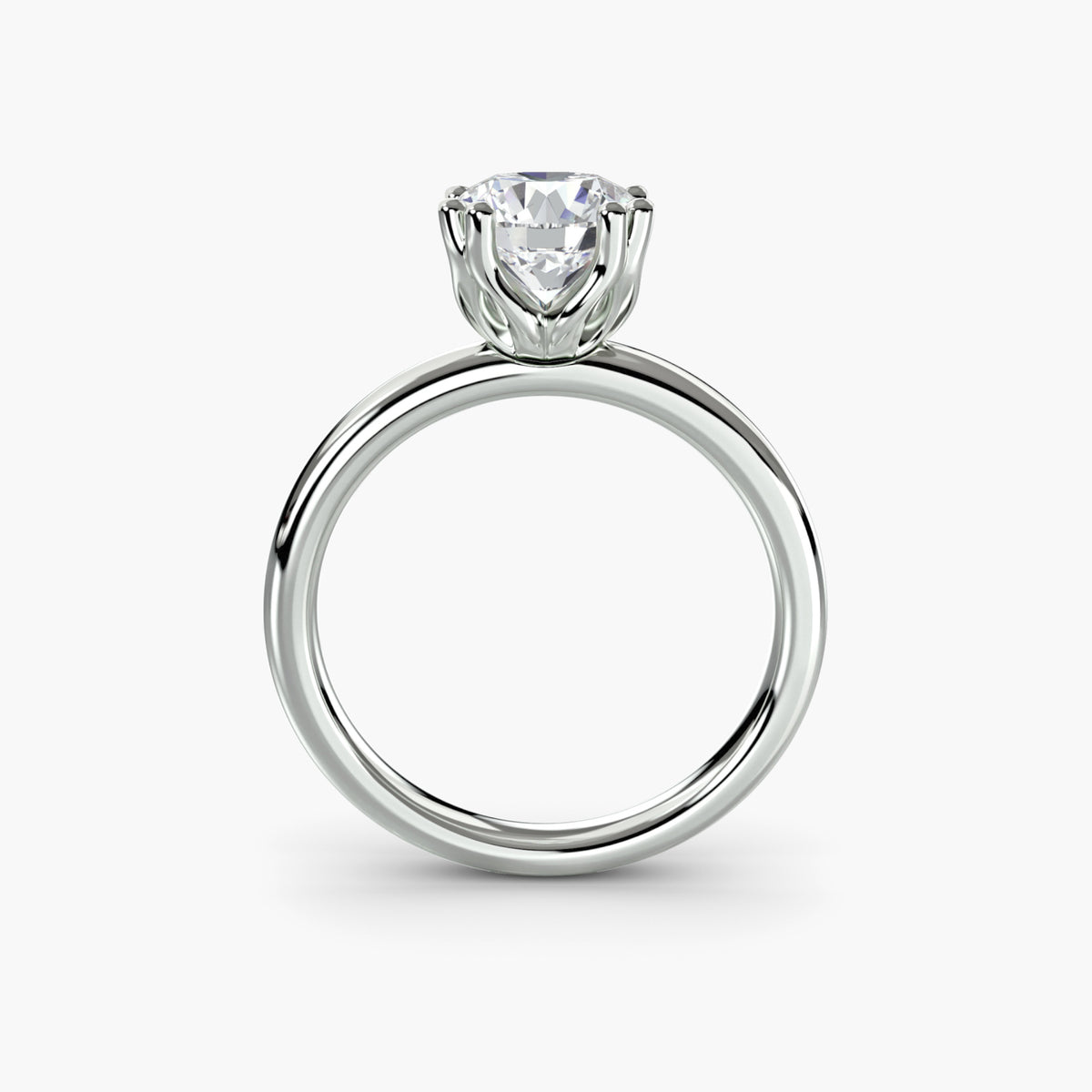 Profile view of four-prong solitaire engagement ring – The Adeline