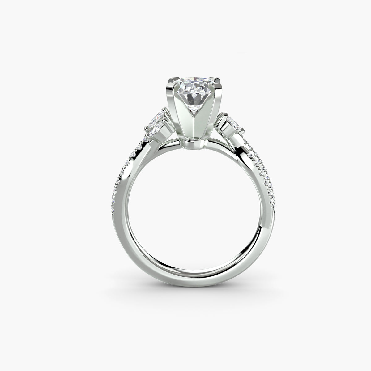Profile view of The Geneviève engagement ring with braided pavé diamond shoulders