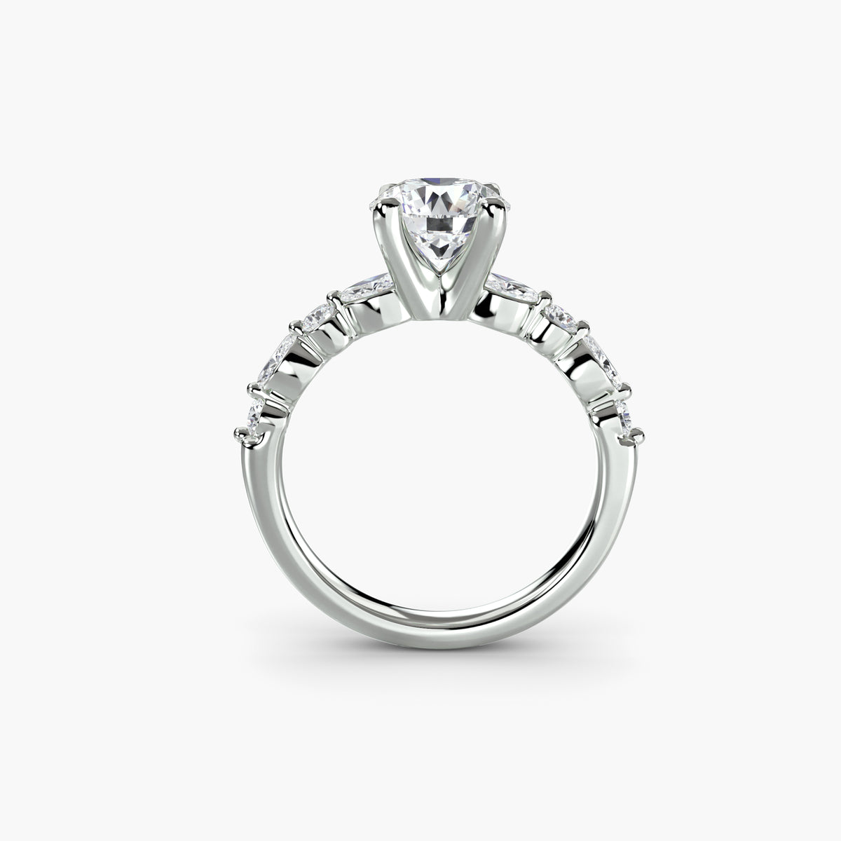 Profile view of The Delphine engagement ring with scalloped round diamond accents